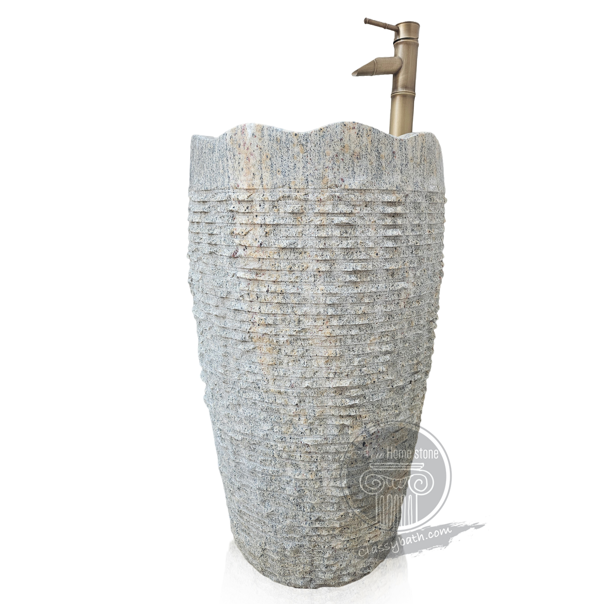 White stone pedestal sink